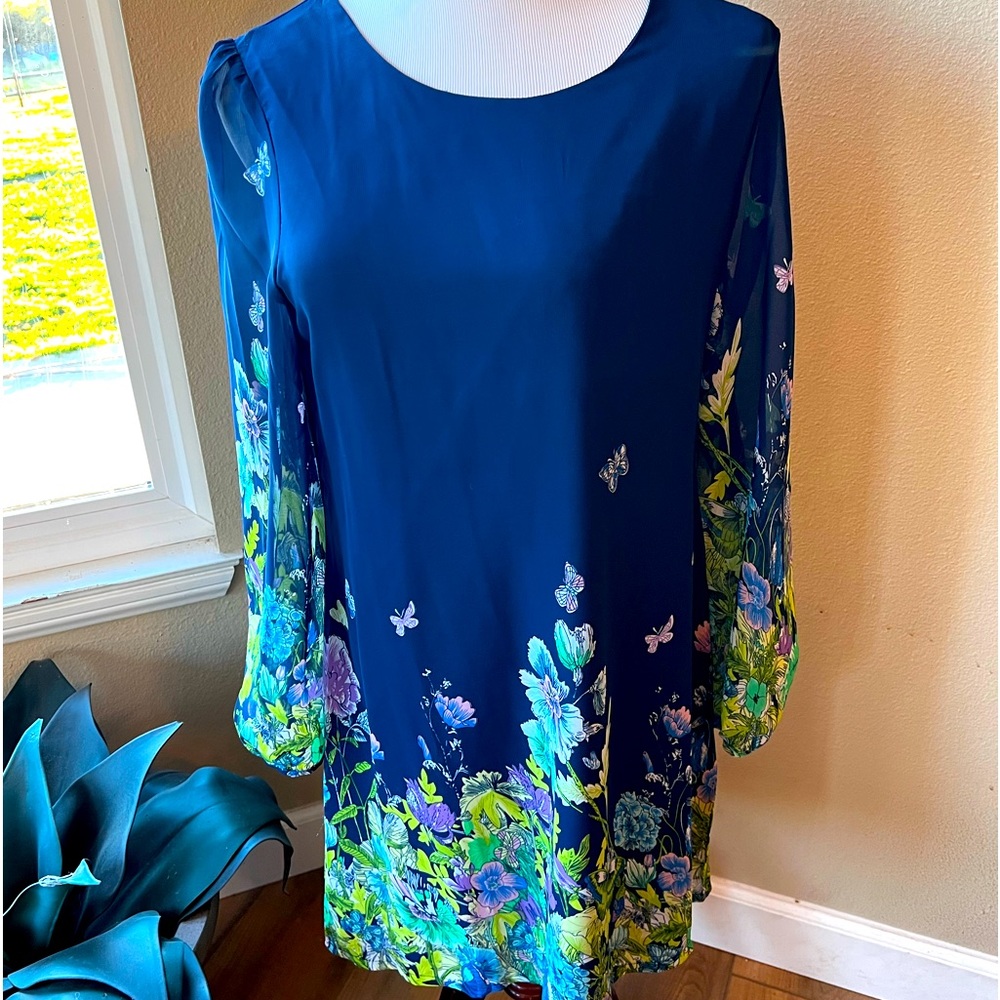Yumi blue long sleeve lined dress size 12 brand new with tags. Butterfly print